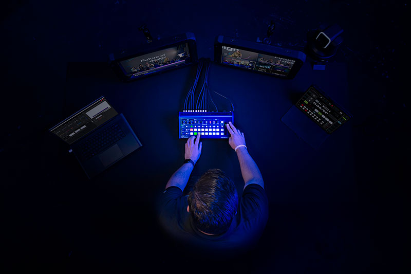 Technician with Roland V-1-4K Switcher