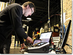 Anderson prepares the Roland VR-50HD for a National Geographic live event.