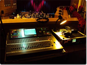 M-480 V-Mixer at the Front of House with Scottish National Jazz Orchestra stage in background.