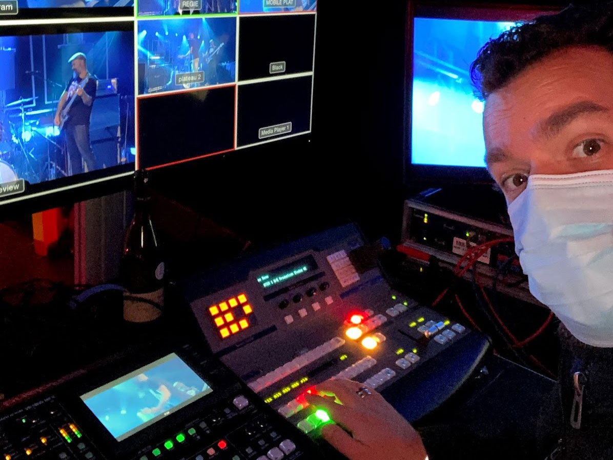 Operator with the Roland VR-50HD MK II Multi Format AV Mixer