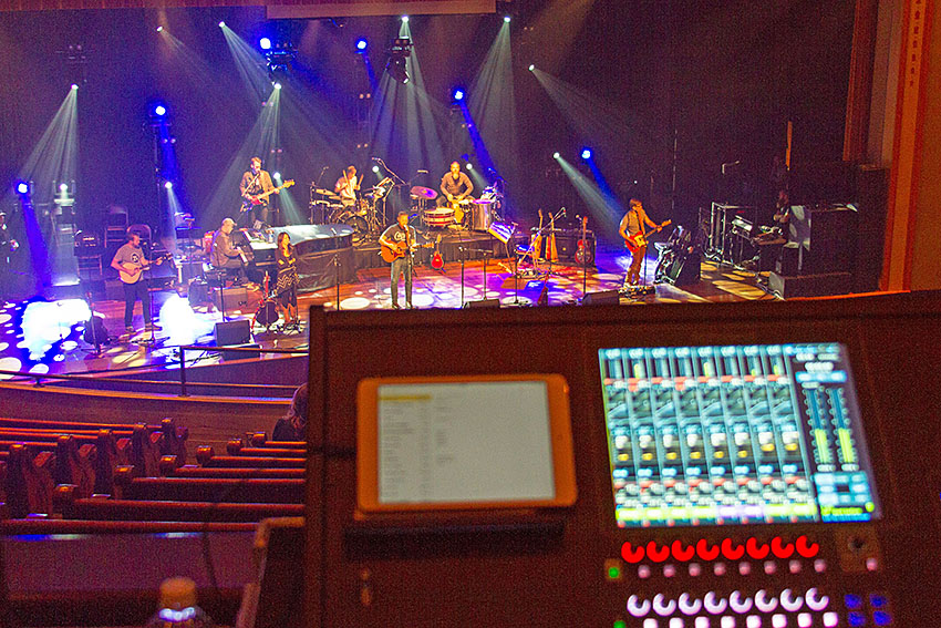 The band for singer/songwriter Andrew Peterson’s Behold the Lamb of God tour, pictured at their recent tour stop at the Ryman Auditorium in Nashville, with the Roland M-5000 Digital Mixing Console in foreground.